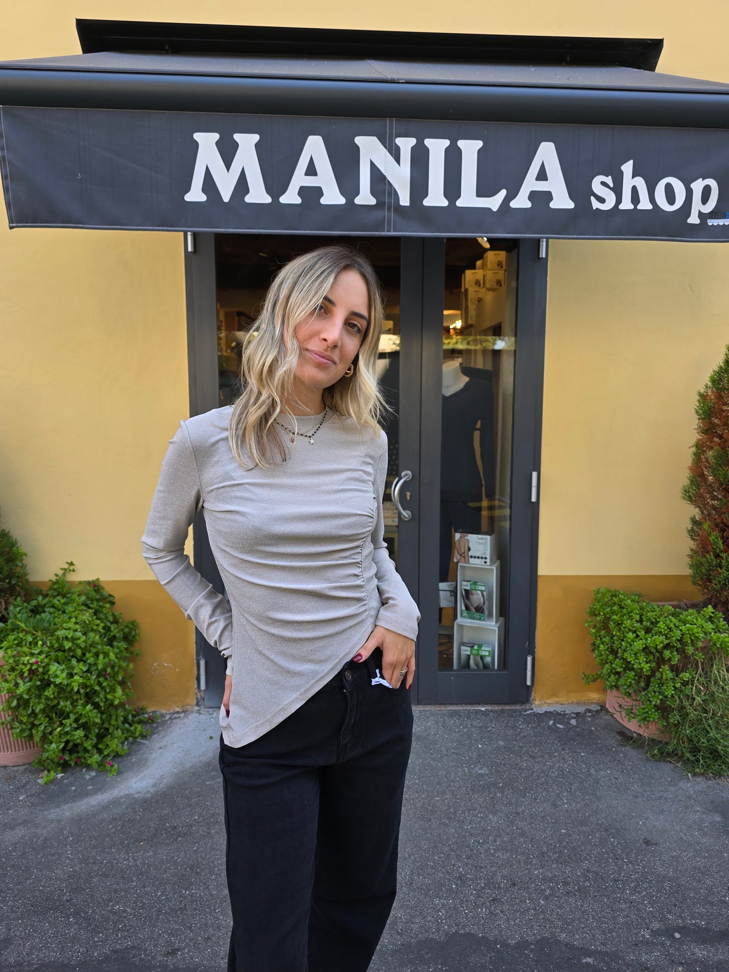 Maglia a maniche lunghe in lurex asimmetrica