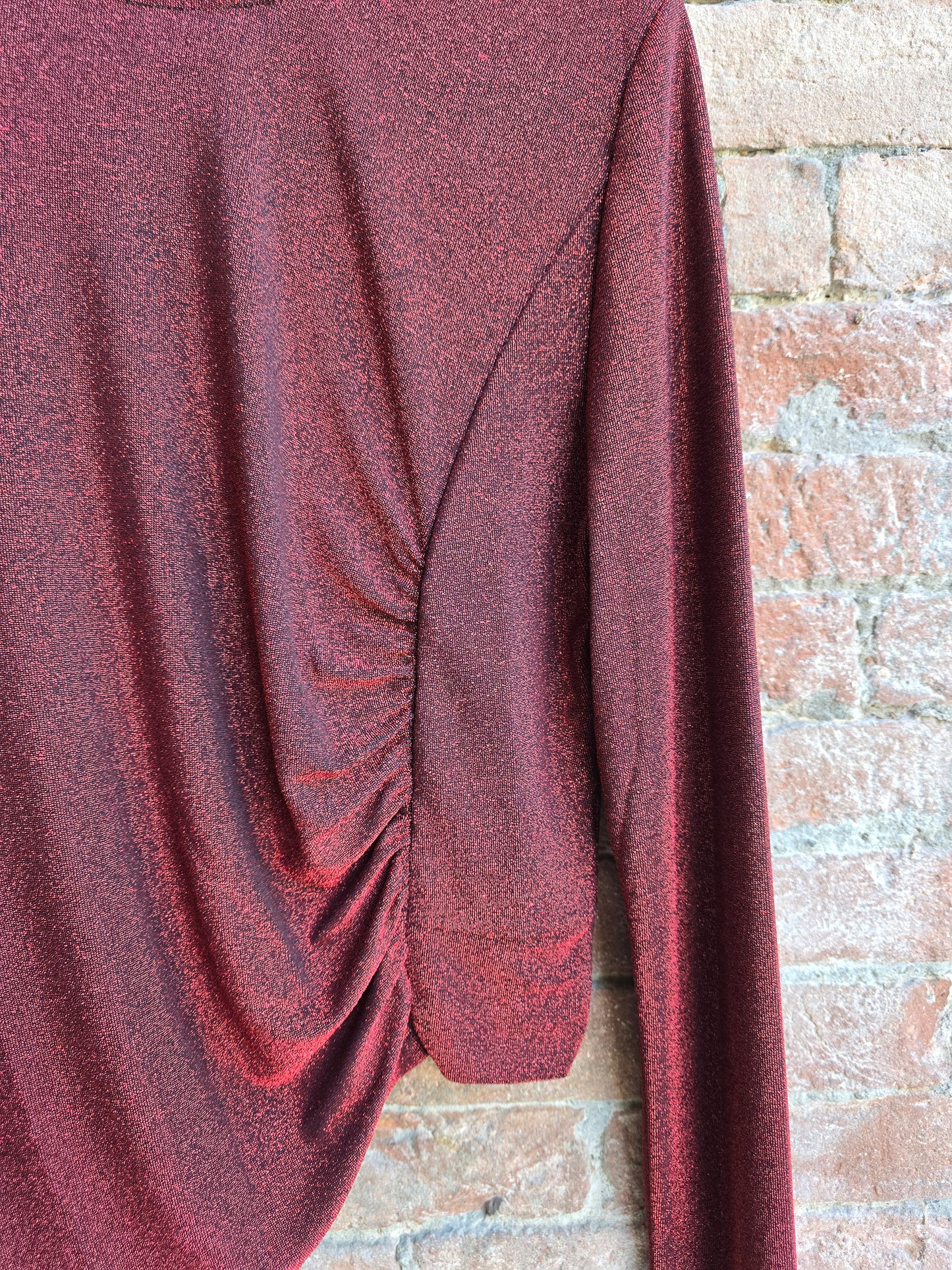 Maglia a maniche lunghe in lurex asimmetrica