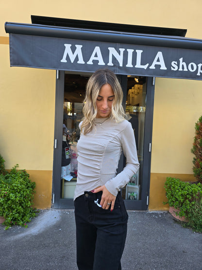 Maglia a maniche lunghe in lurex asimmetrica