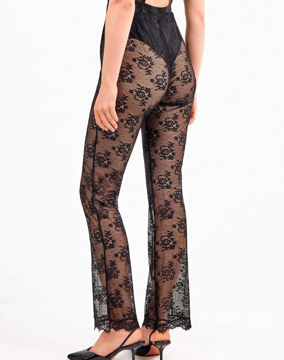 Pantaloni in pizzo floreale trasparente