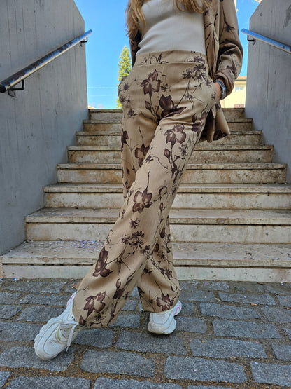 Pantalone a palazzo con elastico in vita a fantasia elegante