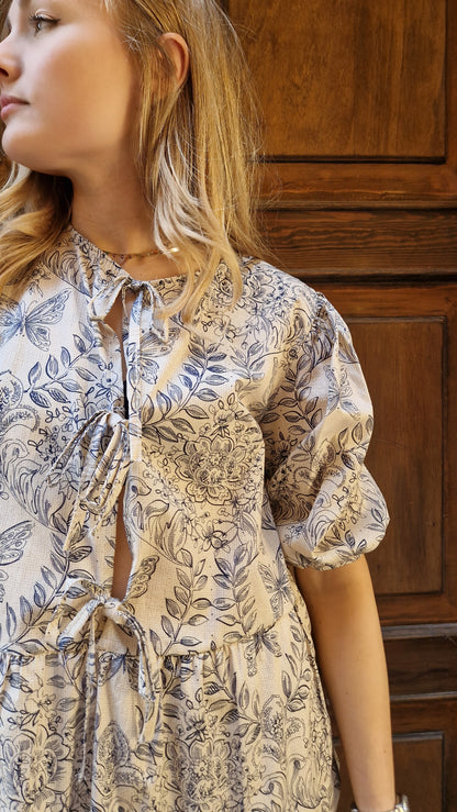 Blusa in cotone a fantasia con fiocchi
