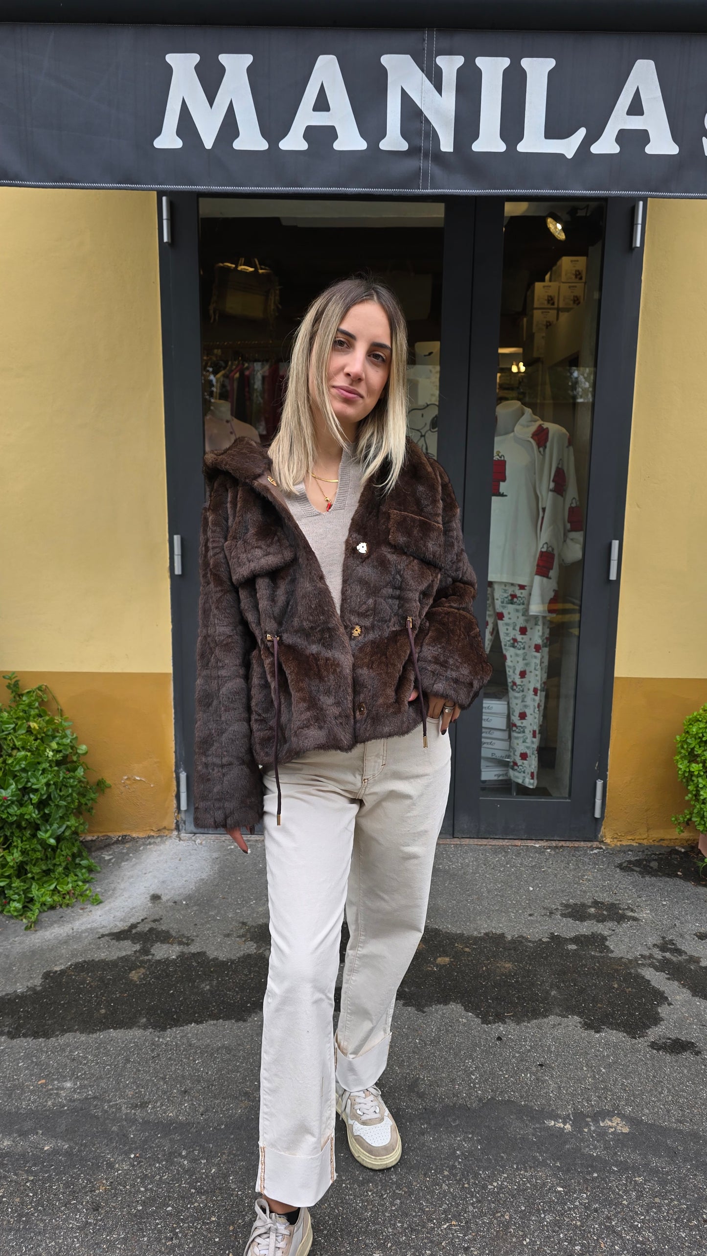 Bomber in ecopelliccia con cappuccio