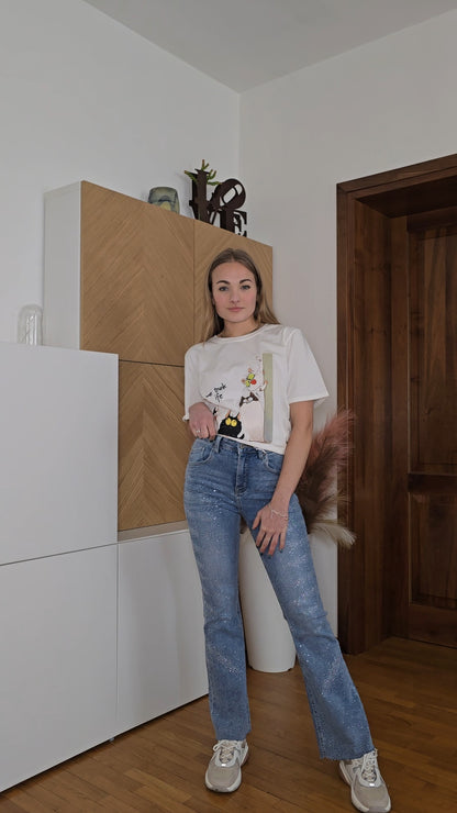 Jeans con brillantini applicati elasticizzati